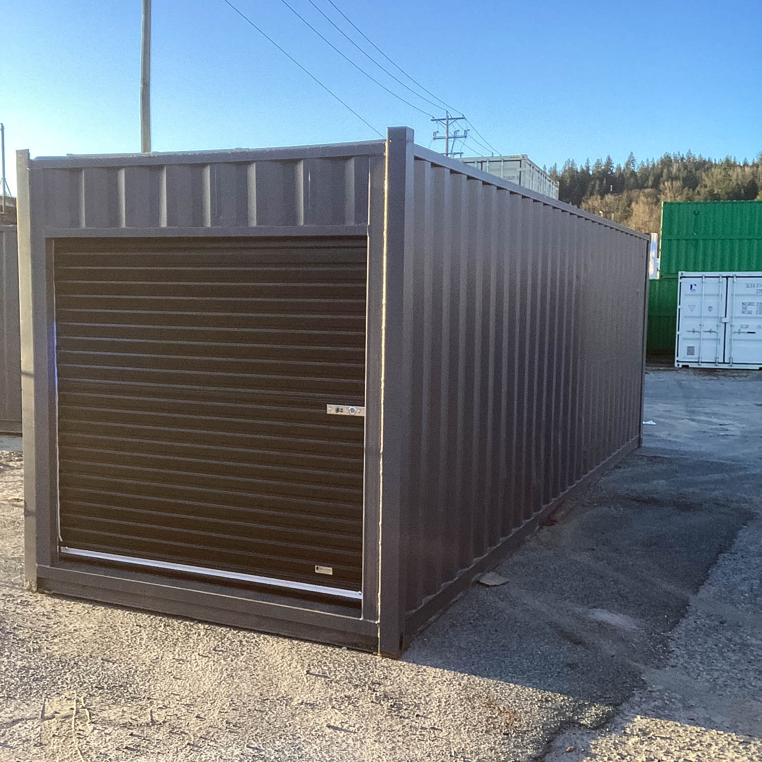 26′ Cut-Down Shipping Container w/Roll-Up Door - Containers Construction PTY LTD